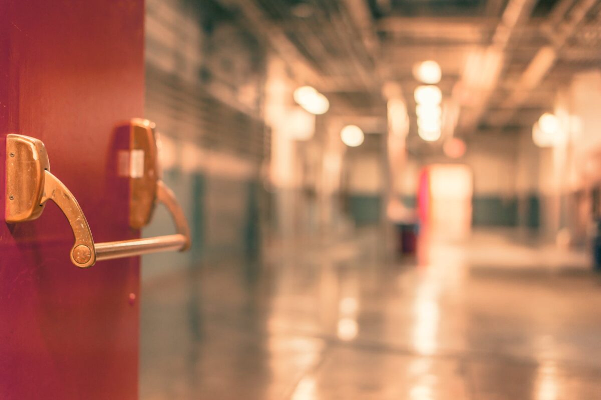 selective focus photography of red door